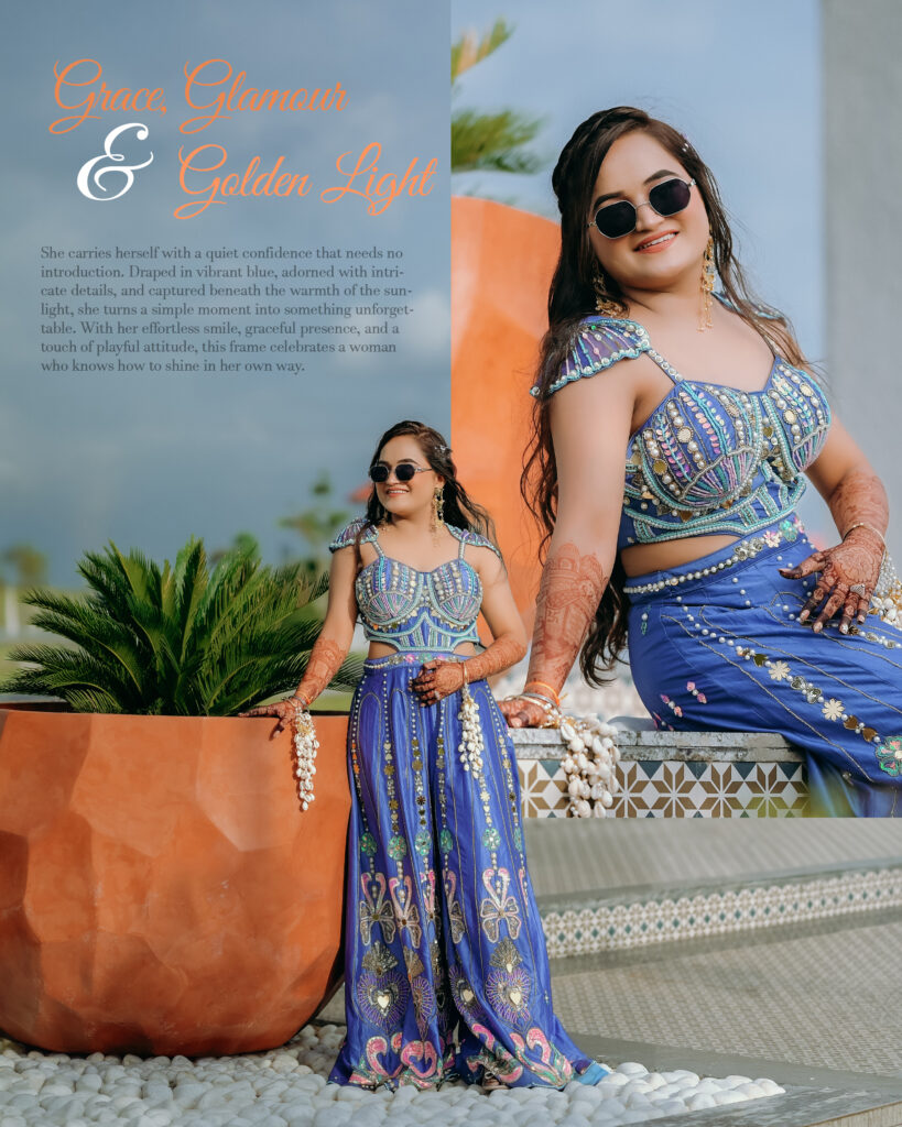 Bride in a blue embroidered outfit with sunglasses and mehendi, posing beside a terracotta planter in Solapur