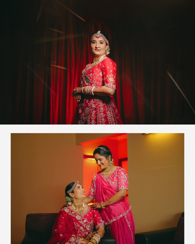 Bride in red lehenga against a red curtain and with her mother in a pink saree, wedding photography in Lonavala