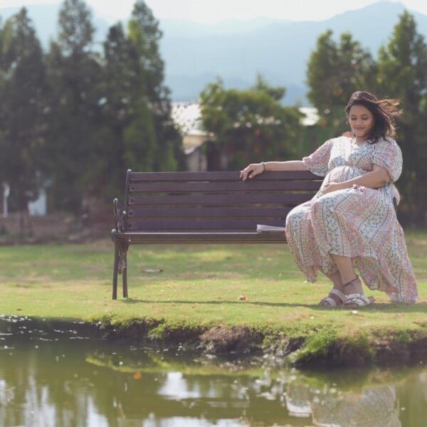 Western gown maternity photoshoot in Solapur with elegant style